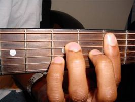 Come si gioca un accordo maggiore 7 per chitarra
